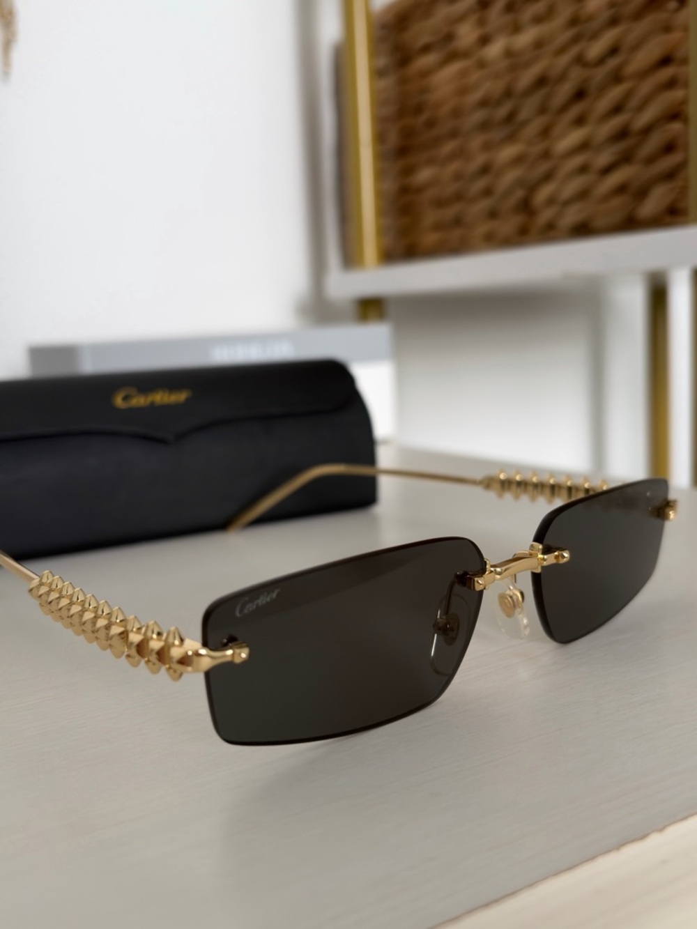 Cartier Gold Rimless Sunglasses with Dark Lenses